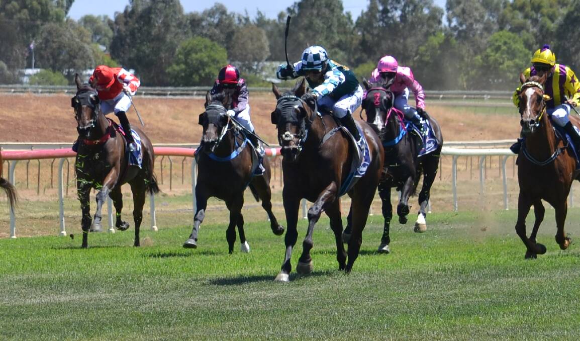 FLYING FINISH: Jake Pracey-Holmes and Valknut powered home at Dubbo Turf Club on Saturday in a welcome return to form for trainer David Smith. Photo: NICK GUTHRIE
