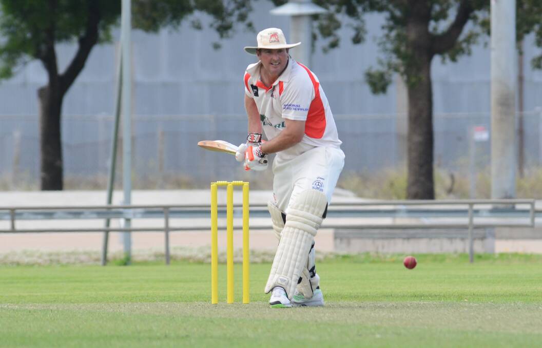 Brad Cox making light work of bowling attacks in his floppy white hat has been a constant in Dubbo this century. File picture