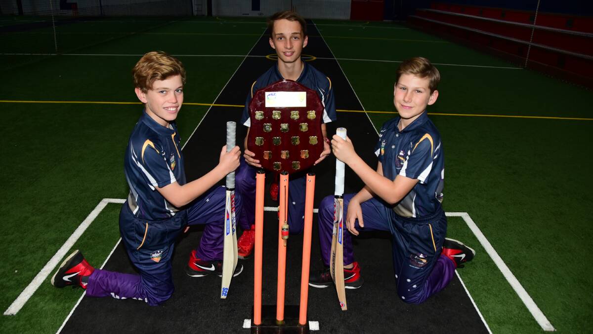 THE CHAMPIONS: Dubbo's Paddy Nelson, Tom Coady and Anthony Atlee with the under 13s national indoor shield. Photo: BELINDA SOOLE