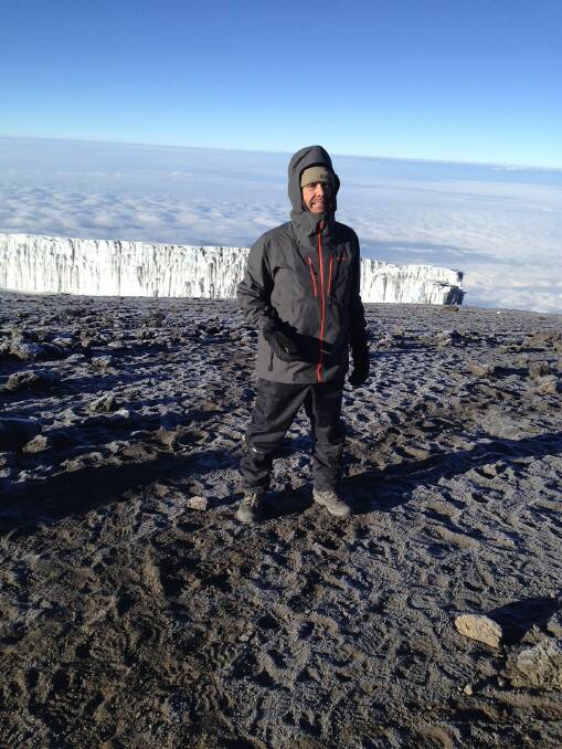 WORLD TOUR: Stephen Jackson whose African adventure combined a safari, a trek, and a tour of Zanzibar, on the summit of Mt Kilimanjaro.