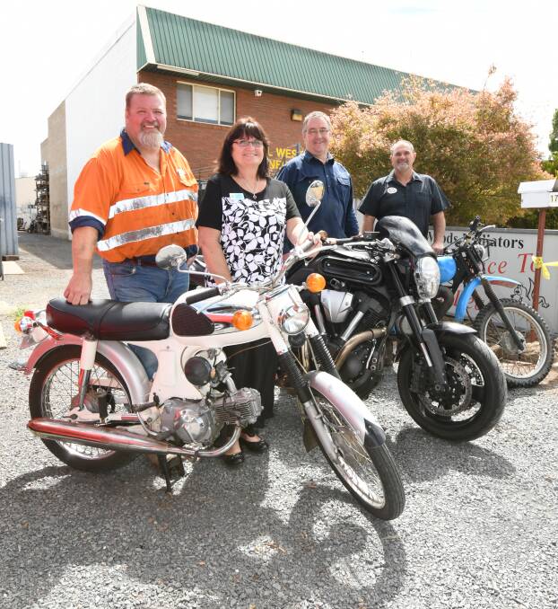 RIDING FOR NEAL: Orange Classic and Cafe Racer members Adam and Lynn Palmer, Andrew Owens and Steve Doherty are riding to raise money for Neal Trevana.
