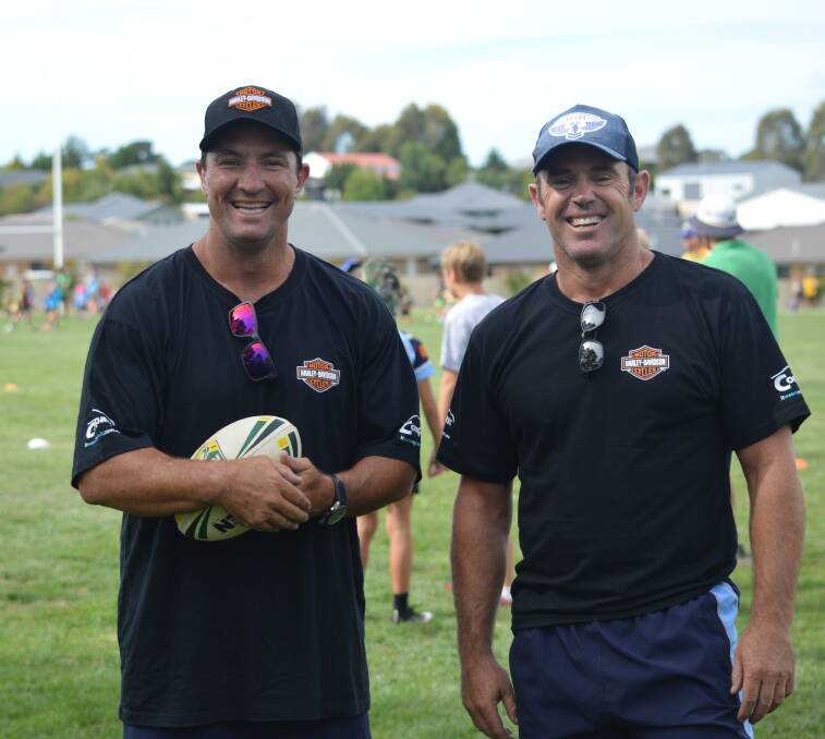 BALL HOGS: NSW State of Origin legends Nathan Hindmarsh and Brad Fittler ran a rugby clinic as part of the NSWRL Hogs For The Homeless tour.