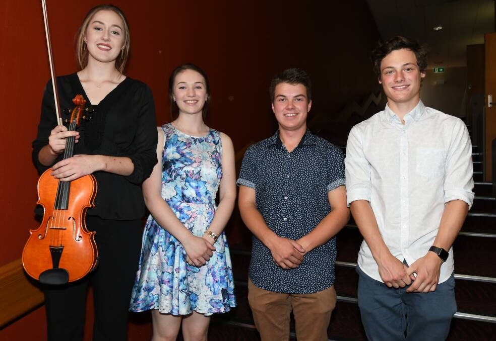 HIGH SCORERS: James Sheahan Catholic High School students Tegan Mackay, Mary Munro, Luke Kelly and Connor Morris received awards for academic achievements.