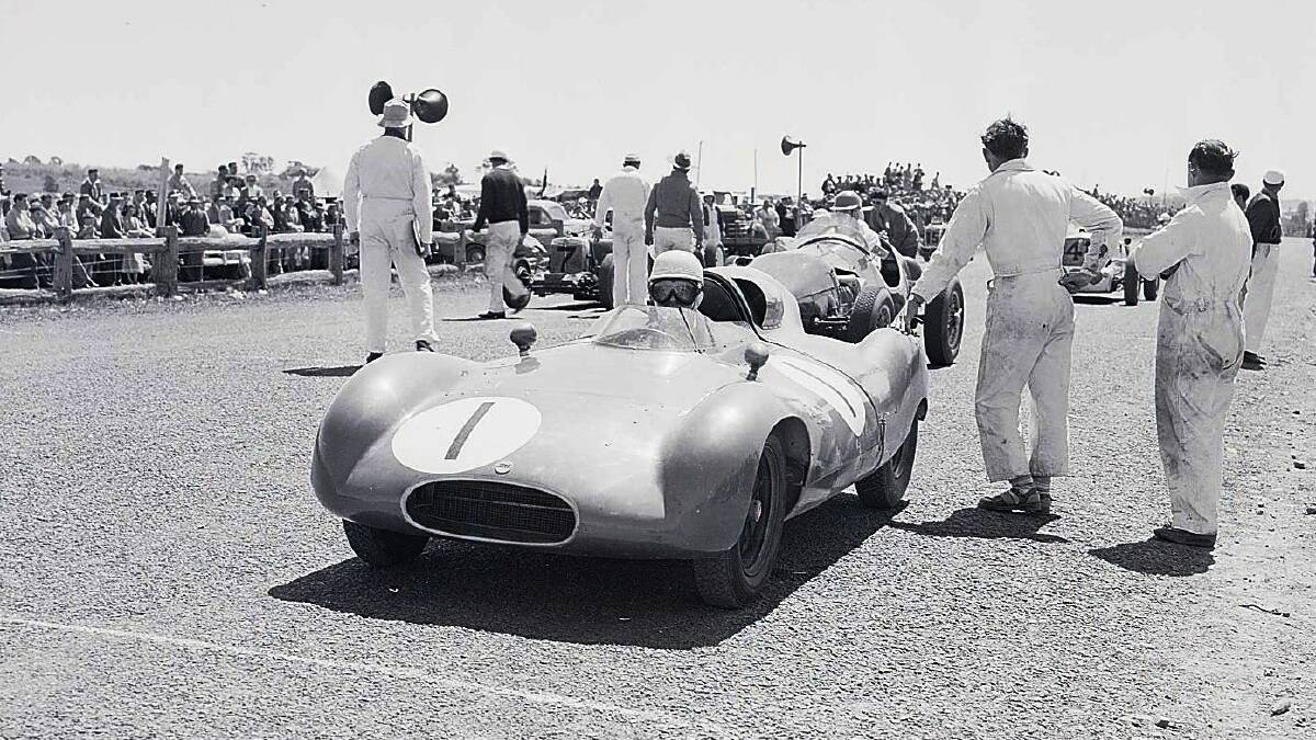 THE GLORY DAYS: Sir Jack Brabham on the starting grid at Gnoo Blas in his bobtail Cooper Climax. Photo: CONTRIBUTED