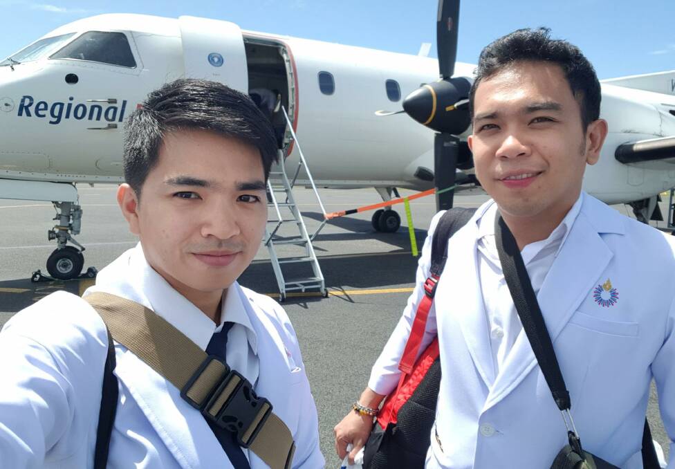 TOUCHING DOWN: Thai students Chaiyanan (Ohm) Munee and Bint (Billy) Parawat Billabong arriving at Orange airport. 