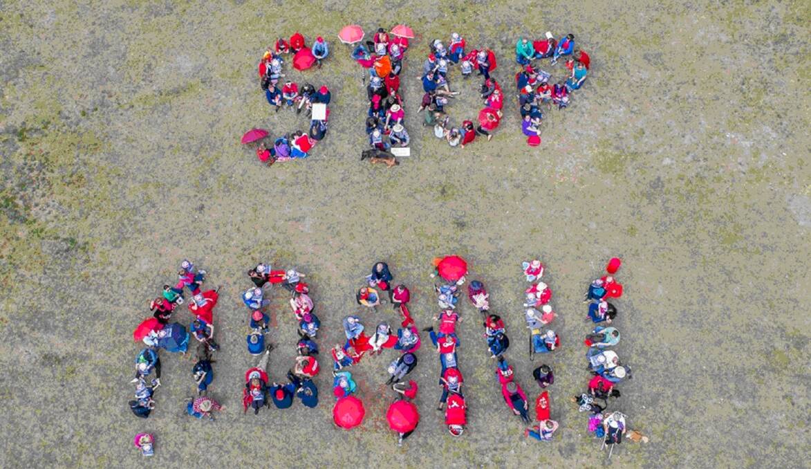 SPELLING IT OUT: Orange was one of 160 Stop Adani groups across Australia making human signs on October 7 in protest of the proposed coal mines.