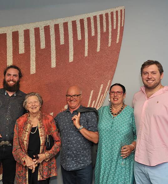 Henry and Lynette Sisley, Charles Cooper, Caro and Clive Sisley in front of Charles Cooper's painting Brierly, based on a speed hump, a metaphor for our own journeys.