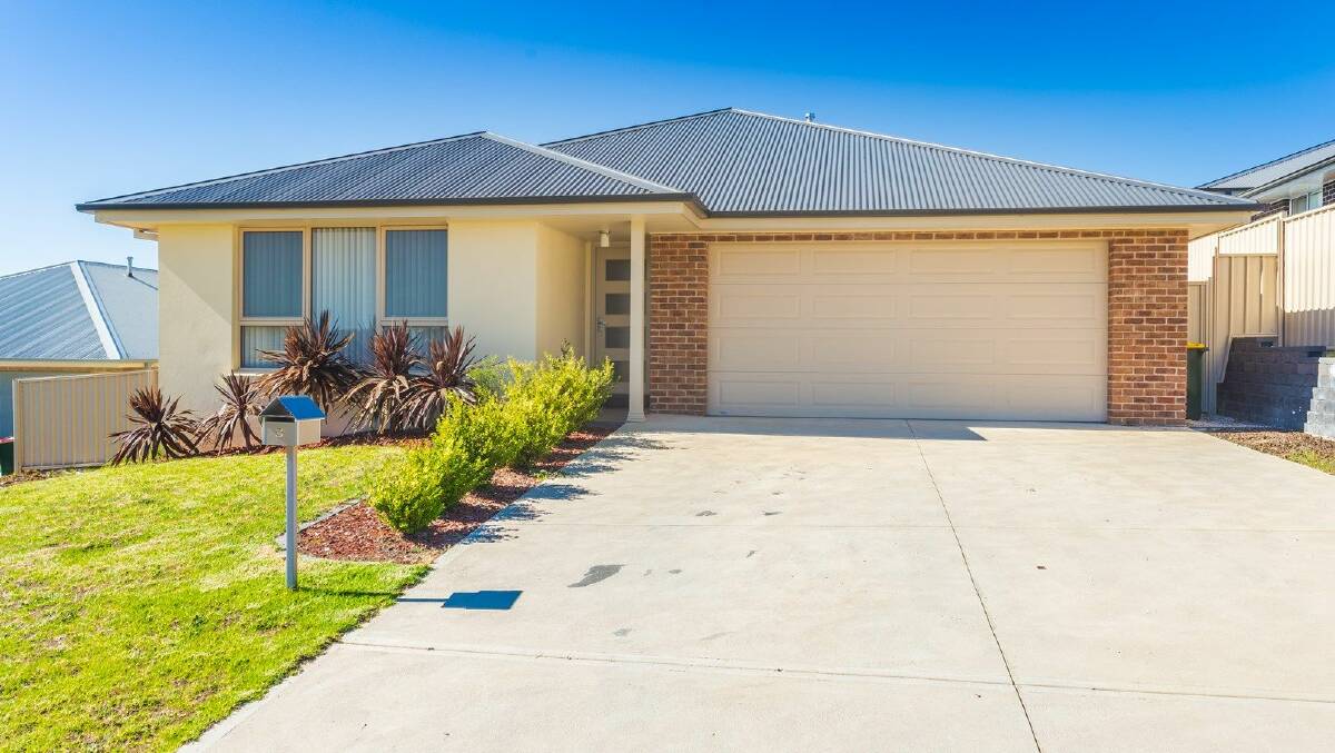 9 DOWNEY CRESCENT: This four-bedroom home offers north-facing, open-plan living and alfresco areas perfect for entertaining.