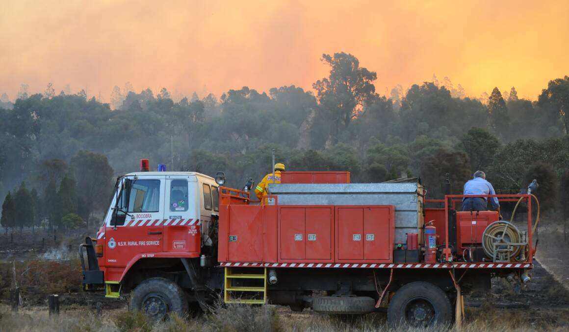 Up in flames: Canobolas Zone crews helped fight the Mandagery bush fire last month. Photo: PARKES CHAMPION-POST