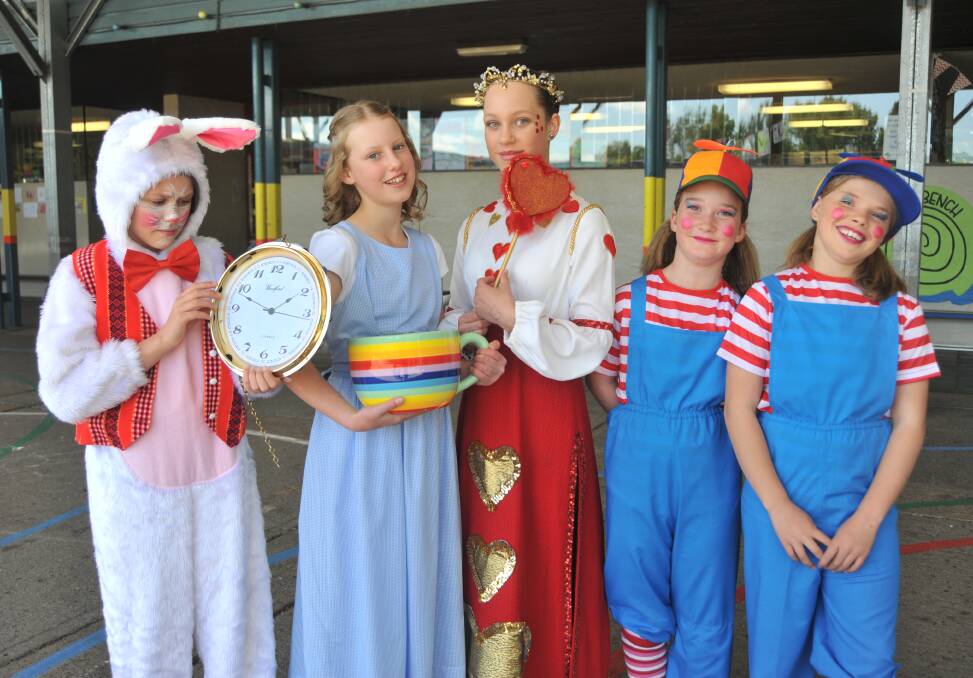 Personal growth: Orange Public School students develop their skillset performing the Alice in Wonderland themed show Curiouser and Curiouser. Photo: Jude Keogh.