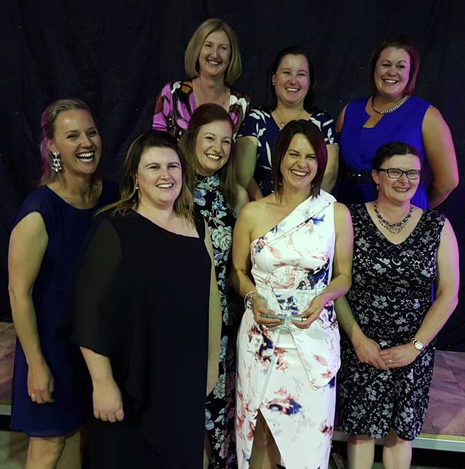2016 Winners: The team from Yates, Baker & McLean Accountants in Molong celebrate after being named the 2016 Cabonne Business of the Year. Photo: Supplied.