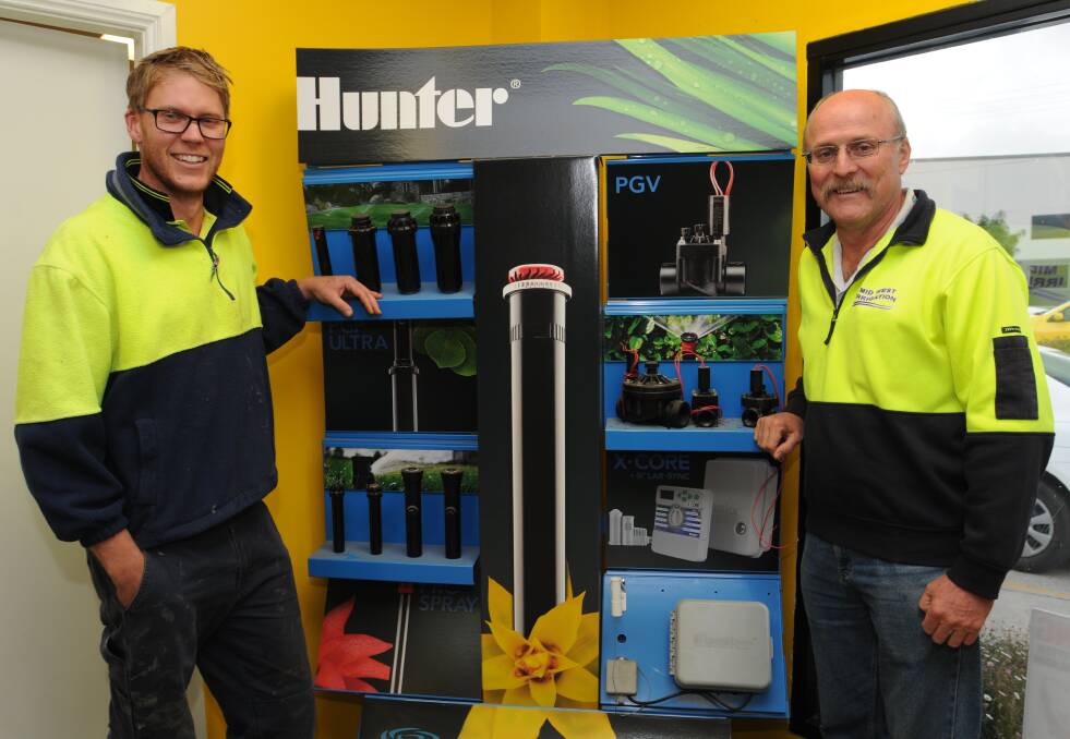 A cause for celebration: Shane & Keith Sproule from Mid-West Irrigation are happy to be celebrating 25 years in business and are inviting you to join them this Friday for sales, sausage sizzles and more. Photo: S.Sproule