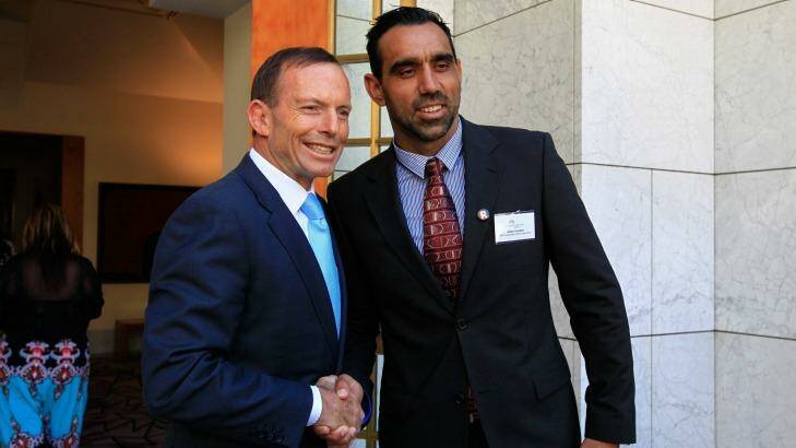 Prime Minister Tony Abbott, pictured with footballer and former Australian of the Year Adam Goodes in 2014, said the Indigenous player was a good person who deserved respect. Photo: Katherine Griffiths