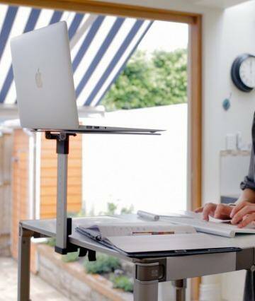 Standing at work is proven to be better for your health, and one Aussie doctor has come up with a portable solution. Photo: Supplied
