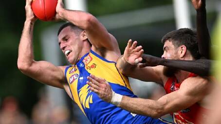 Jake Waterman marks. Despite the loss, Adam Simpson saw merit in the Eagles' performance. (Dave Hunt/AAP PHOTOS)