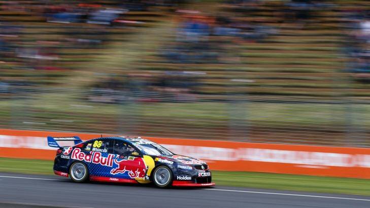 Title battle: Jamie Whincup goes for it in the ITM Auckland SuperSprint. Photo: Mark Horsburgh