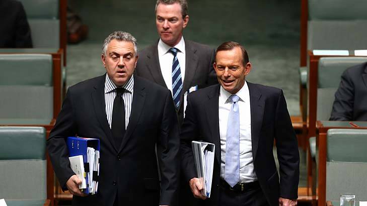 Under siege: Treasurer Joe Hockey, Christopher Pyne and Prime Minister Tony Abbott arrive for Question Time. Photo: Alex Ellinghausen