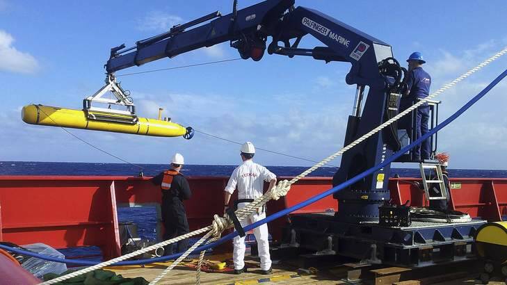 The Bluefin 21, the Artemis autonomous underwater vehicle, is hoisted back on board the Australian Defence Vessel Ocean Shield after a buoyancy test. Photo: Australian Defence Force