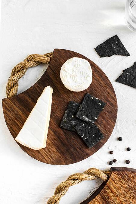 Kara Rosenlund's love for authenticity and adventure is celebrated through her photography, and now in her new range of kitchen products. Cheese board, $65, shop.kararosenlund.com. Photo: Supplied