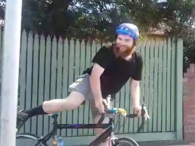 Victoria Police are on the lookout for a belligerent bearded cyclist who injured a female driver.