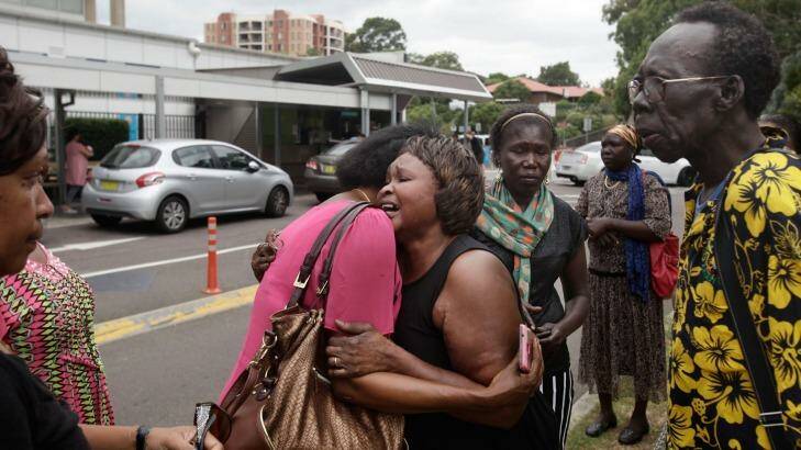 Emotional family members outside Westmead Hospital after crash at Marayong in which three passengers died.
 Photo: Fiona Morris