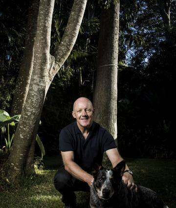 Malcolm Knox with Bruce his blue heeler-kelpie cross, at home in Sydney Photo: Dominic Lorrimer