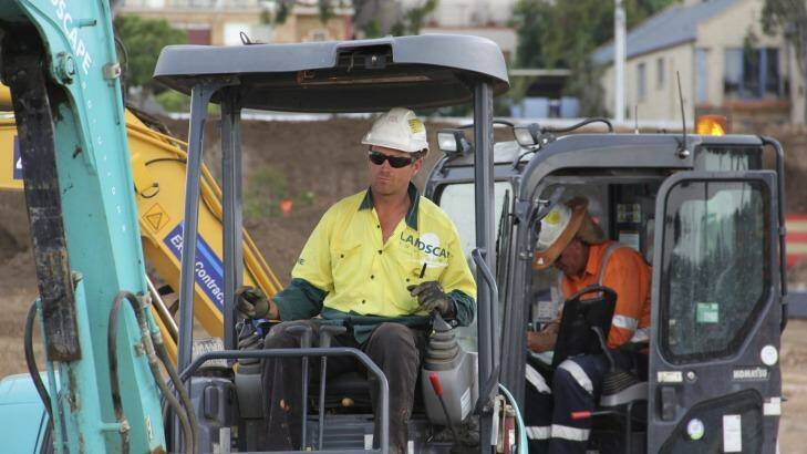Landscape Solutions employee Paul Scurfield on a six-tonne excavator. He and his co-workers need constant retraining with new technology. Photo: Supplied
