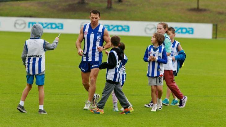 Brent Harvey plays Pied Piper at North’s family day. Photo: Ken Irwin