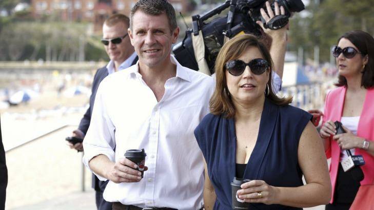 Premier Mike Baird and his wife Kerryn in Manly on Sunday. Photo: James Brickwood
