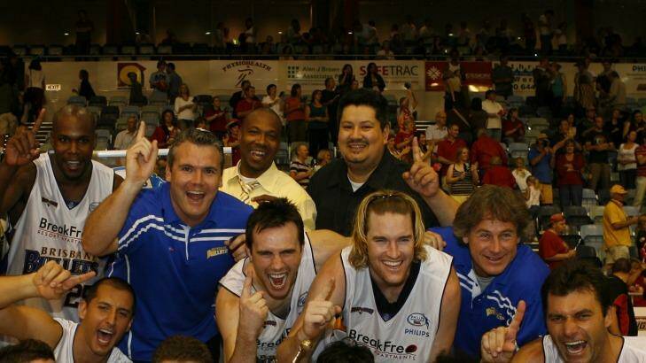 Glory days: Brisbane Bullets celebrate their 2007 grand final triumph. Photo: Vince Caligiuri