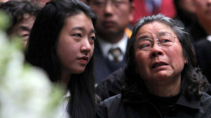 Brenda Lin and her grandmother Feng Qing Zhu at the Lin family funeral in 2009. Photo: Lee Besford