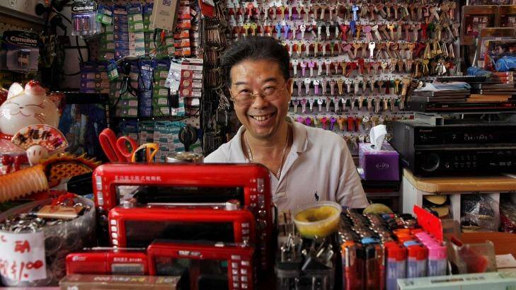 Jacky gets ready to tackle the New Year rush. He's run the Shun Fai Modern AV Co in Sussex Street for the past 25 years. Photo: Shu Yeung