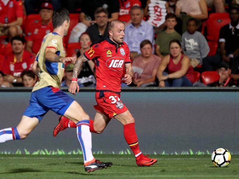 Adelaide have sounded a warning their A-League finals rivals, beating Newcastle 5-2.