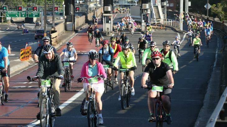 Who needs a car? Participants cross the Harbour Bridge in the 2014 Spring Cycle.  Photo: Anthony Johnson