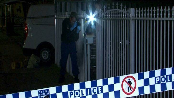Police at the scene of the stabbing. Photo: Nine News