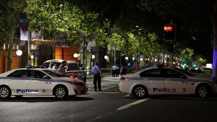 Police at the scene of the shooting of Michael Ibrahim on Macquarie Street, Sydney, in January. Photo: Kate Ausburn