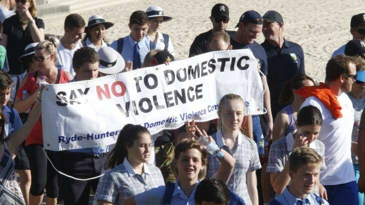 Thousands pack Coogee Beach as part of a walk in support of White Ribbon Day.   Photo: Peter Rae