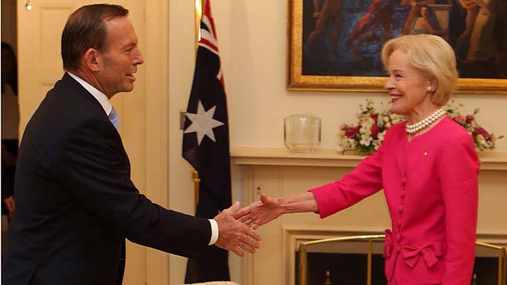 Outgoing Governor-General Quentin Bryce, pictured with Tony Abbott on Tuesday, will be the first dame after the reintroduction of the honour. Photo: Andrew Meares