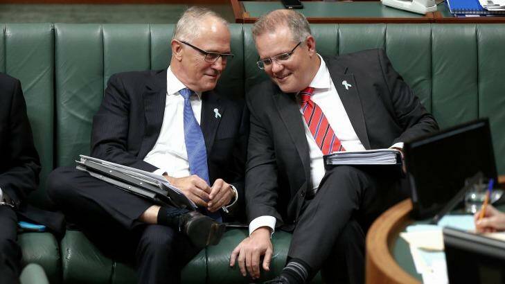 Communications Minister Malcolm Turnbull and Immigration Minister Scott Morrison in Question Time. Photo: Alex Ellinghausen