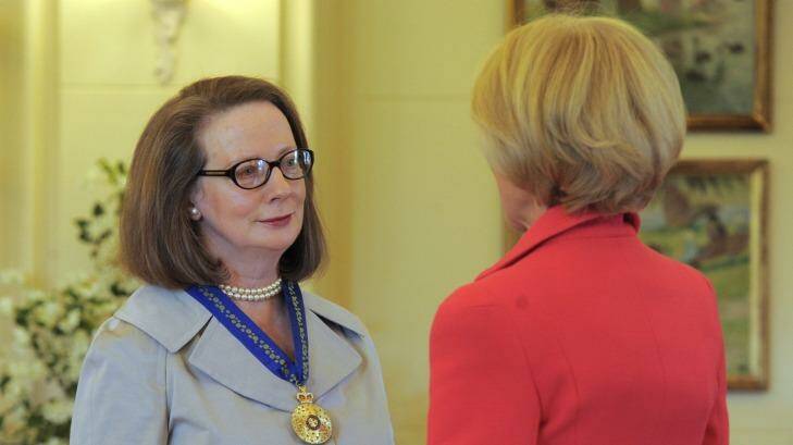 Susan Kiefel receives a Companion, in the General Division in the Order of Australia, from governor-general, Quentin Bryce in 2011. Photo: Graham Tidy