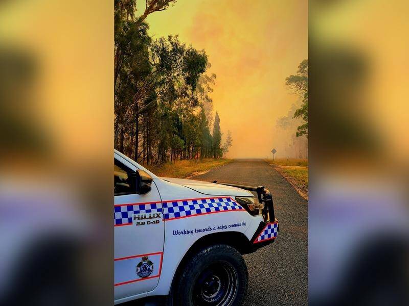 The northern NSW town of Tenterfield has been surrounded by seven dangerous blazes. (HANDOUT/QUEENSLAND POLICE)