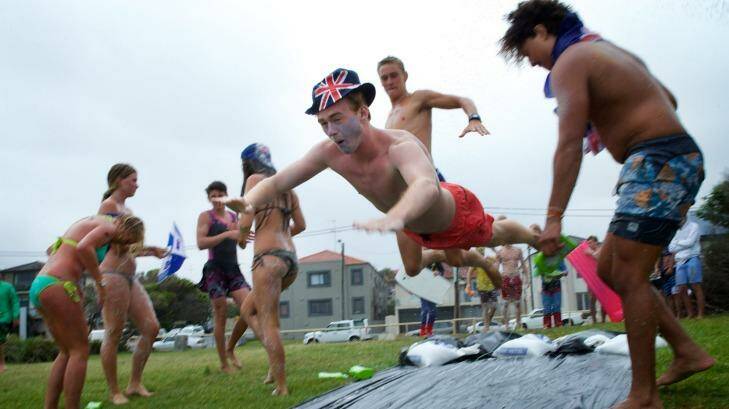 Young Maroubra locals set up a long water slide to celebrate Australia Day. Photo: Wolter Peeters