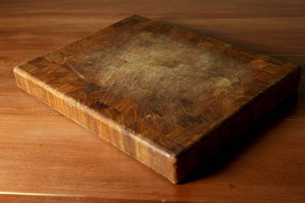 Favourite: 'I've had this wooden chopping board for 15 years. It was made by a kitchen hand in a hotel I used to run. It's such a beautiful piece. Every six months I flip it, salt it, give it a scrub, wash it all off and rub a bit of olive oil into it.' Photo: Pat Scala