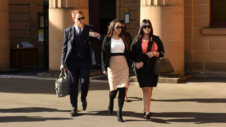 Lexy May Jamieson (centre) leaves Darlinghurst court on Monday.