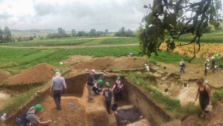 ANU students carry out excavation of a Transylvanian cemetery in Romania.  Photo: Supplied