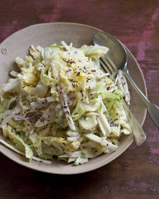 Karen Martini's cabbage slaw with sour cream, apple and caraway <a href="http://www.goodfood.com.au/good-food/cook/recipe/savoy-cabbage-slaw-with-sour-cream-apple-and-caraway-20121120-29n7y.html"><b>(recipe here).</b></a> Photo: Marina Oliphant (Props from The 
