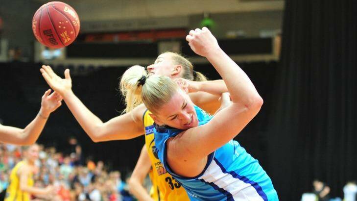 Former Sydney Flames player Mikaela Ruef  takes on her new team Canberra Capitals in 2015. Photo: Melissa Adams