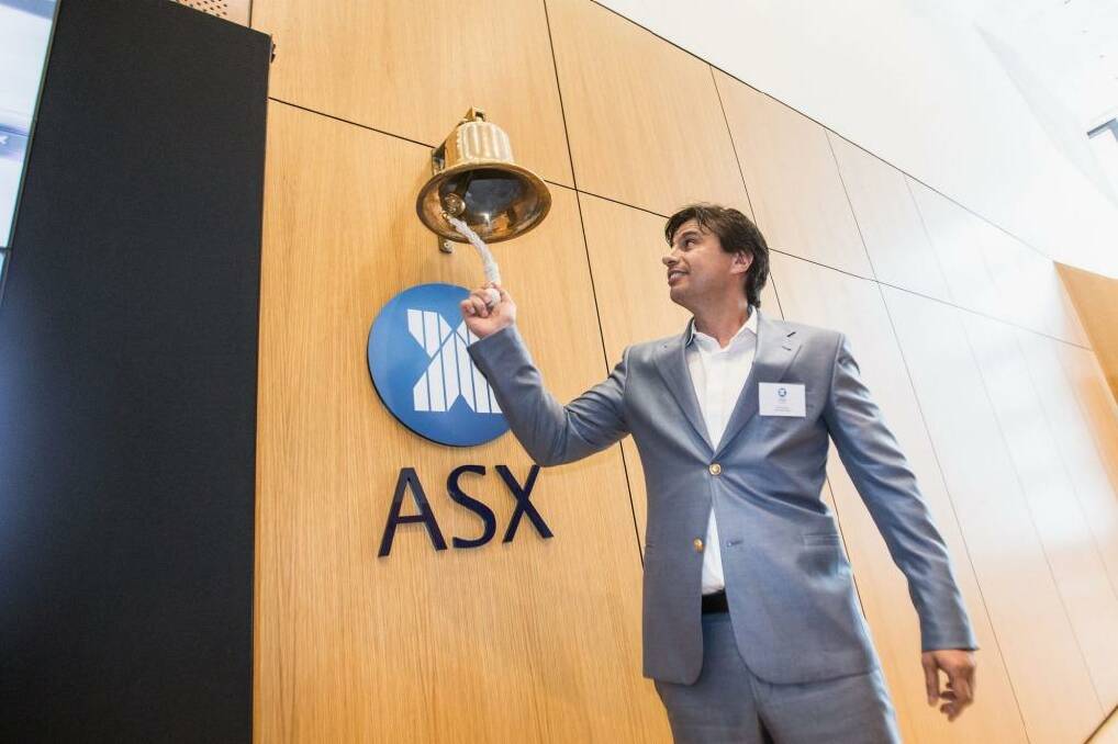 Estia Health founder Peter Arvanitis rang the bell to kick off ASX trading of his company's shares - ringing in early losses for its investors. Photo: Cole Bennetts