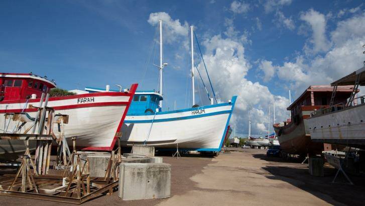 Two of the Vietnamese fishing boats in a Darwin boat yard on Thursday.  Photo: Glenn Campbell