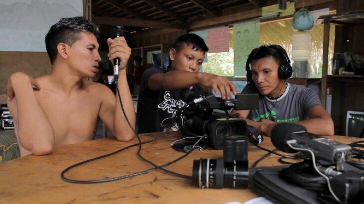 From left,?? Ricardo Pukimapiweiteri Yanomami, Silvano Ironasiteri Yanomami and?? F????bio Iximaw????teri Yanomami work on their audio visual skills.?? 